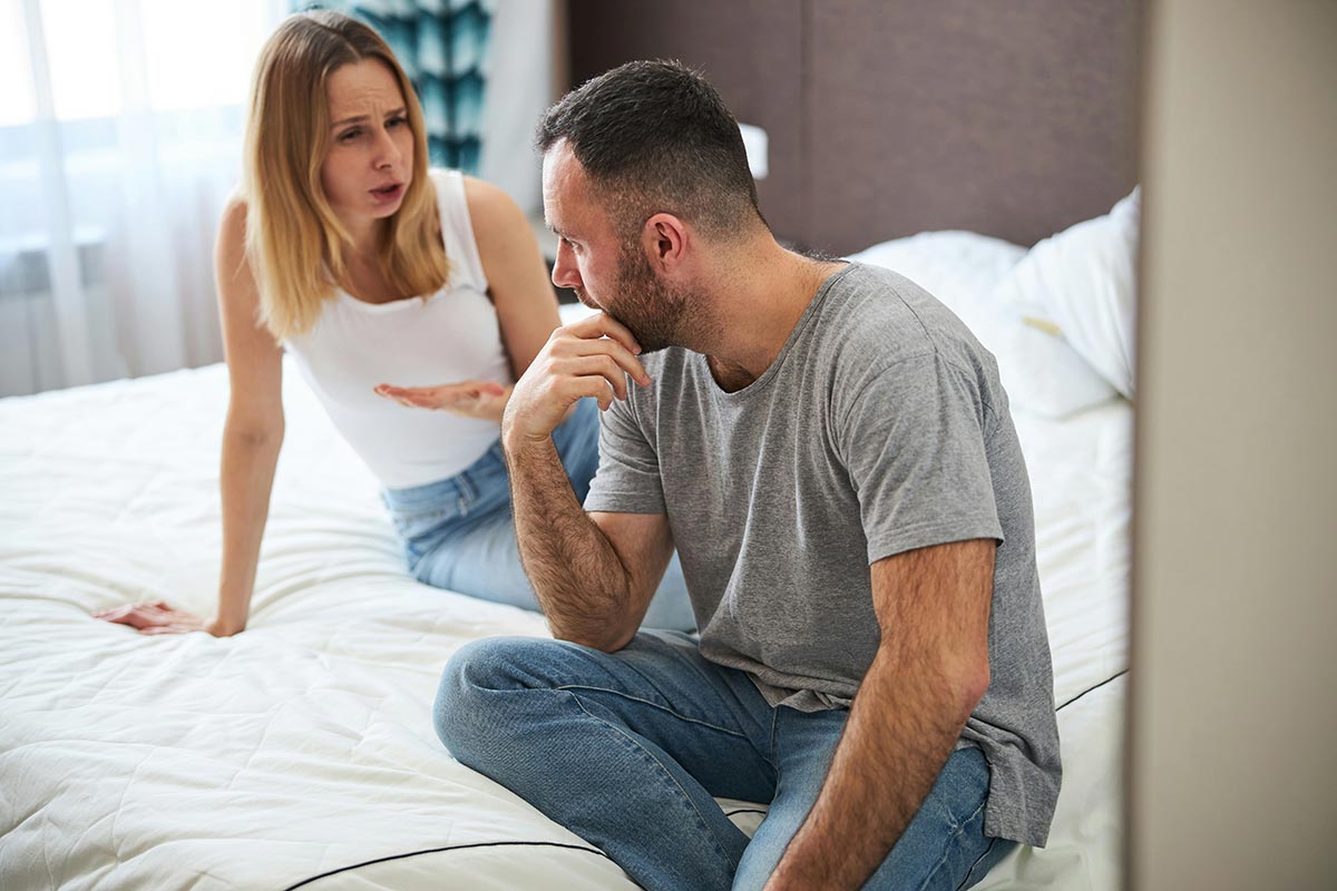 a husband and wife talking about mental health issue