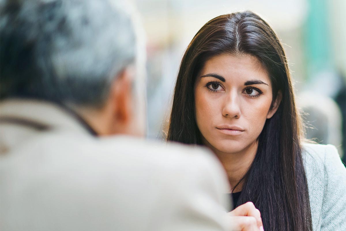 a man talking to his loved one with mental health issue