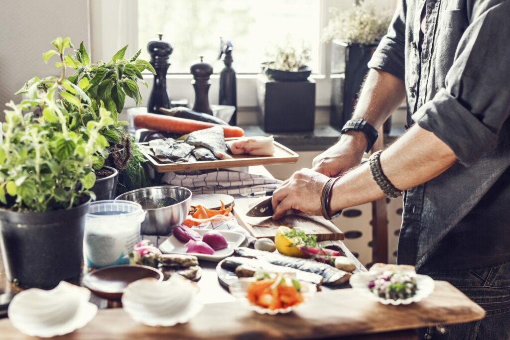 Man prepares a fresh meal at home
