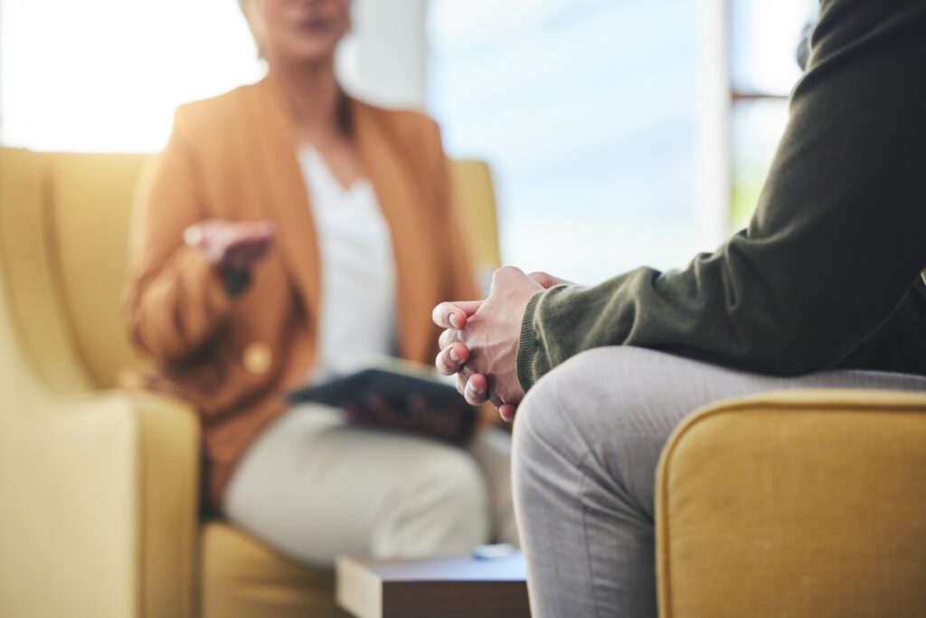 Therapy session with a therapist in a sunny room