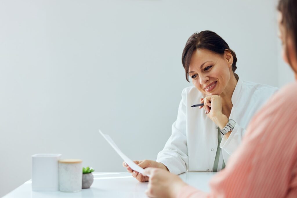 A healthcare professional explaining care information to a client